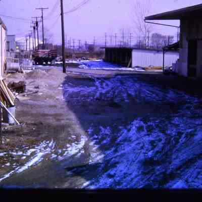 Alleys behind Michigan Ave EB businesses, east of town. South Side.