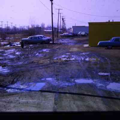 Alleys behind Michigan Ave EB businesses, east of town. South Side.