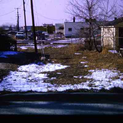 Alleys behind Michigan Ave EB businesses, east of town. South Side.