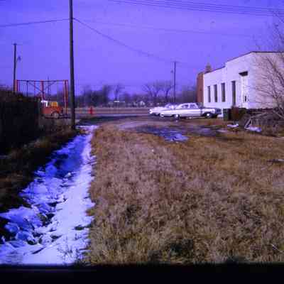 Alleys behind Michigan Ave EB businesses, east of town. South Side. Westlawn Cemetery across Street