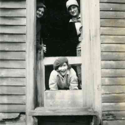 Marie Lucas on left standing and Mary Margaret Davidson (Mast) standing on right.