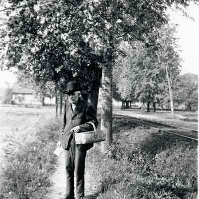 Otis Warner on path along MI Ave with DUR Tracks behind him.