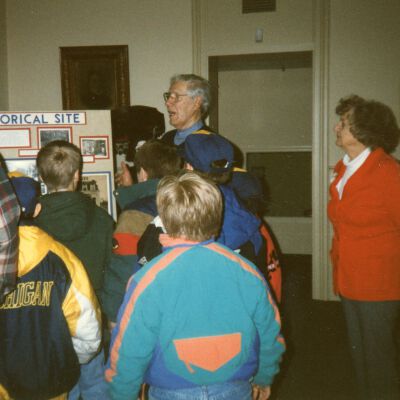 Henry Goudy telling the Bear Cub Scouts Pack 724 the History of the Museum