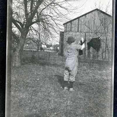Women hanging laundry.