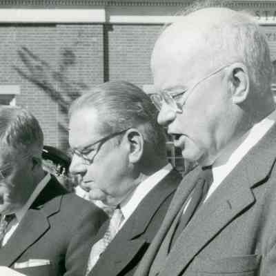Bishop Reid in center, Rev. D. Dalton
