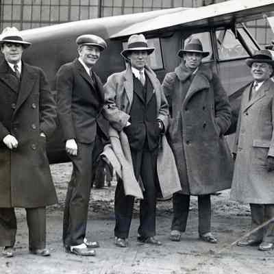 William a. Mara, Eddie Stinson, Col. Clarence M. Young, Capt John F. Donaldson and A. P. Toppar of Stinson Aircraft Corp.
