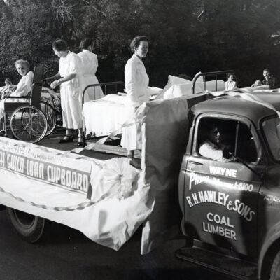 Wayne Norwayne Health Guild Loan Cupboard float in parade