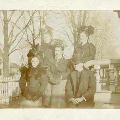 Back: ? and Effie in Front: ?, Estelle Bunting and Charles J Brand in the front of the Stellwagen Home on Main St.
