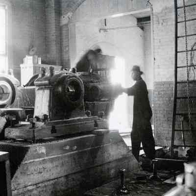 Employee working at the Imperial Oil Company Pipe Line Station
