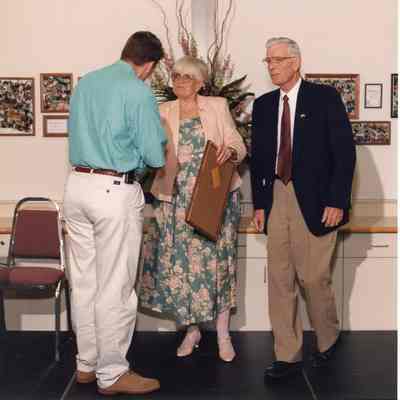Unknown, Audrey Tucker in center, Tom Kelly