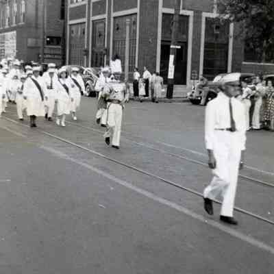 Wayne High School band. Michigan Avenue at Biddle. Detroit Edison Building at right.