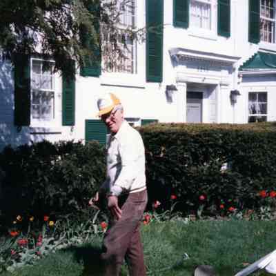 Hank Goudy in orange hat. 1986 new sidewalk