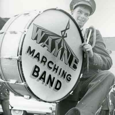 Gary Dell carrying bass drum