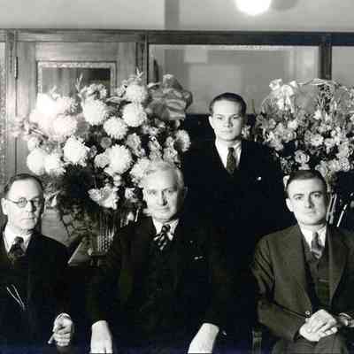 L-R: Tom Littlr, Alex Moore, John Vallance. Standing: W. William. Wayne Federal Savings & Loan