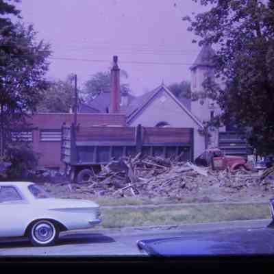 Demolition for Urban Renewal. Baptist church in background.