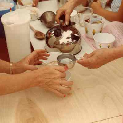 Making bread at the Sunday School, Out Door Service and Homecoming on July 18, 1982.