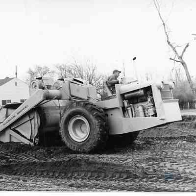 D.P.W Paving a Road