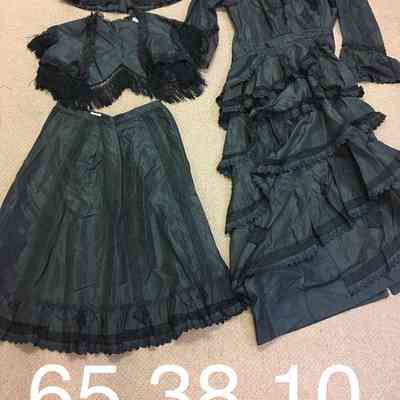 Black dress with matching petticoat ca. 1870s - 1880s