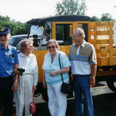 Hank and Seraphia Goudy, Bob and Jayce Little. Wheelfest parade 1996 with Gotfredson truck.