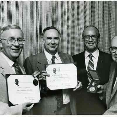 Rotary Members getting A Paul Harris Fellow Award