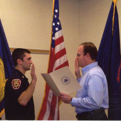 Firefighter being sworn in by City of Wayne Clerk