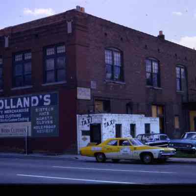 1972. Slide. Taxi Building on side.