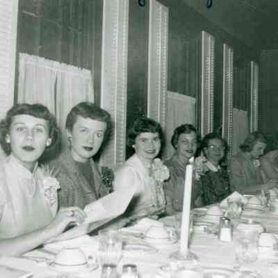 Sondra Anderle, Shirley Hickey, Alice Niddrie, Miss D Joan Watson, Miss Irma Kionka, Joan Worden, Pattie Bingel at the Banquet.