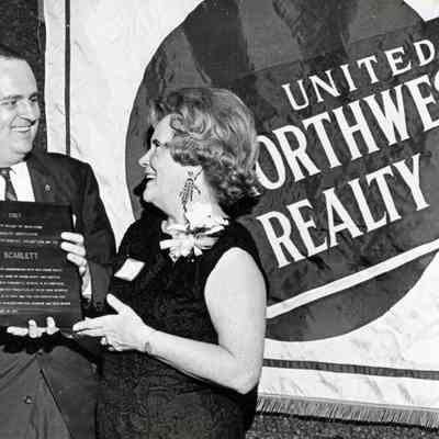 Evelyn Scarlett (Mac) got an award from Realtors Assoc for Red Cross Work