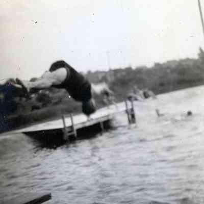 Mac diving off diving board at Wayne's fist outdoor pool.