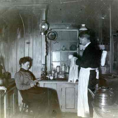 Brandt Warner washing the dishes.