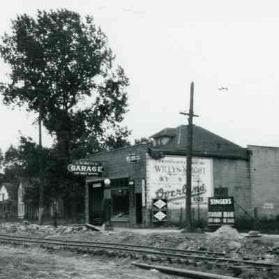 C.K. Miller Garage, 34869 Michigan. South side of Michigan west of Second, at Park. Photo is looking SE. Visible streetcar tracks.