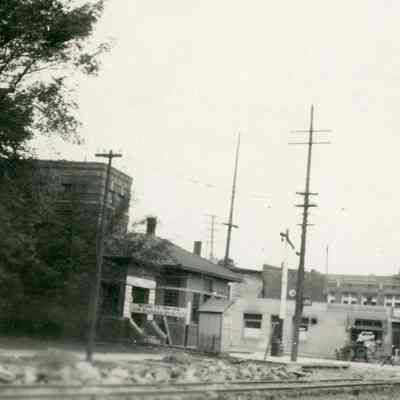 South side of Michigan at Wayne road, looking SW. Streetcar depot at left, Wayne road, then Monroe and Hoops Block