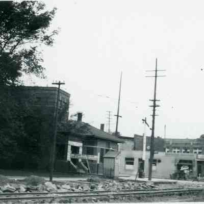 South side of Michigan at Wayne road, looking SW. Streetcar depot at left, Wayne road, then Monroe and Hoops Block