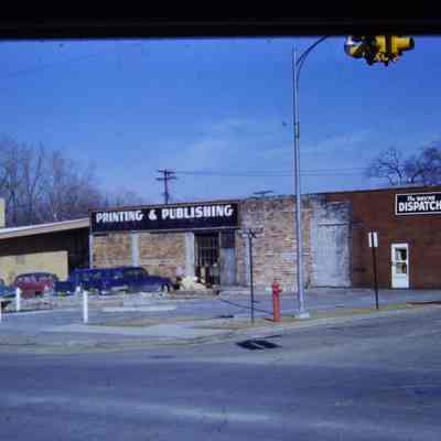 Slide. Building on corner demolished by March 1959.