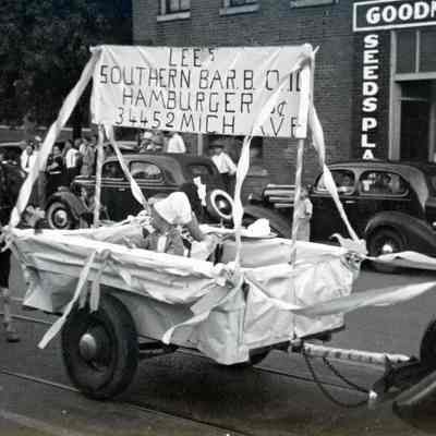 Lee's Hamburgers float. Michigan avenue in front of Goodmans feed store