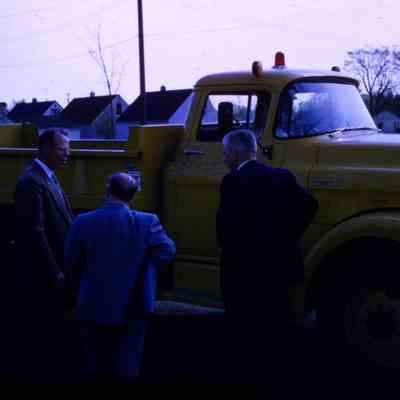 City officials looking at Truck - 1956