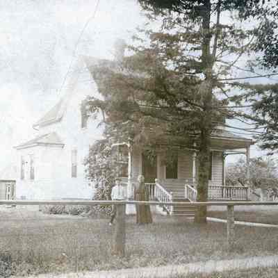 Lucy Vallance with her grandson, Donald (Vallance) Campbell at the Vallance home on Monroe in about 1914.