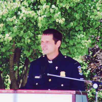 Wayne Police Officer Chaplin at Sept 11 Memorial.