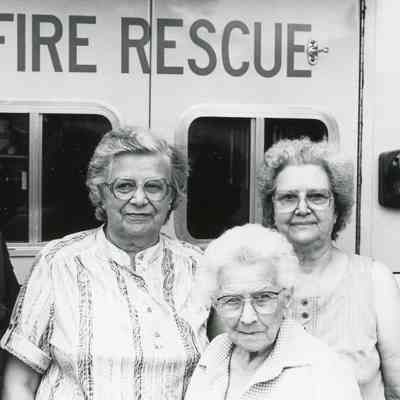 Firemen EMTs with women