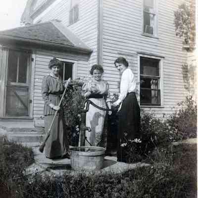 Cecil Gleason, Ellen Martin and Malvina McCannian at the Martin's house.