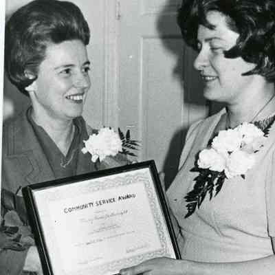 Mary Rose Cartwright being recognized for her service.