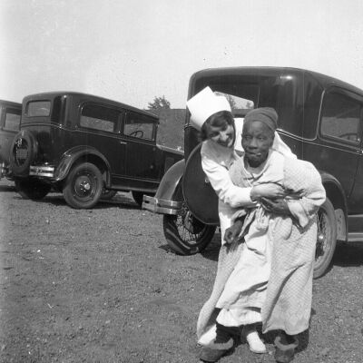 Eloise Nurse with 100 Year old woman