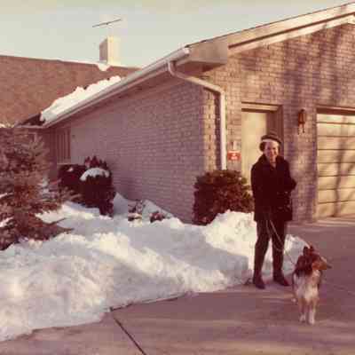 Eileen Lekas at her house with her dog on 38945 Glenwood Ave in Wayne Michigan in the winter of 1975.