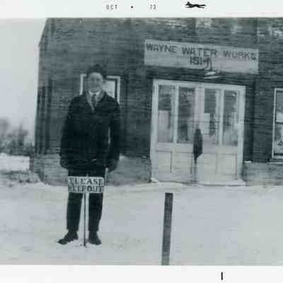 Roger T. Cullen about 1920 in front of the first water works building on Wayne Rd.