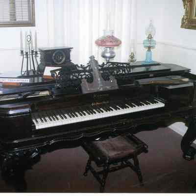 Square Grand Piano that was owned by hotel owner Daniel Newkirk. Photo taken in 2009.