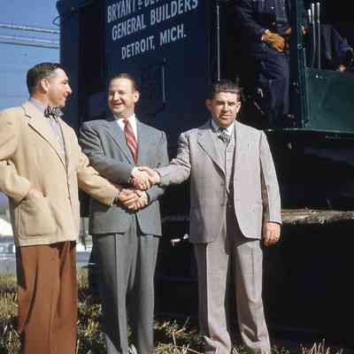 Governor G Mennen Williams, William Clay Ford in center, Vincent “The Chin” Gigante