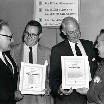 Newspaper owners receiving awards