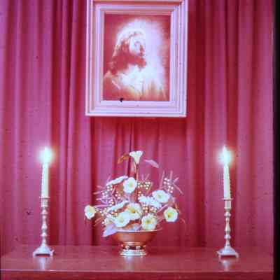 Candles, Flowers and Portrait of Christ