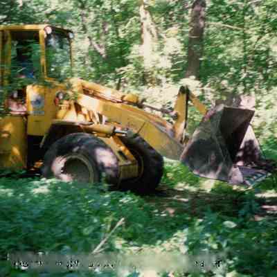 Dennis Henn operating the front loader.
