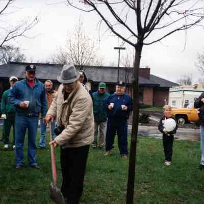 Planting memorial tree in Goudy Park